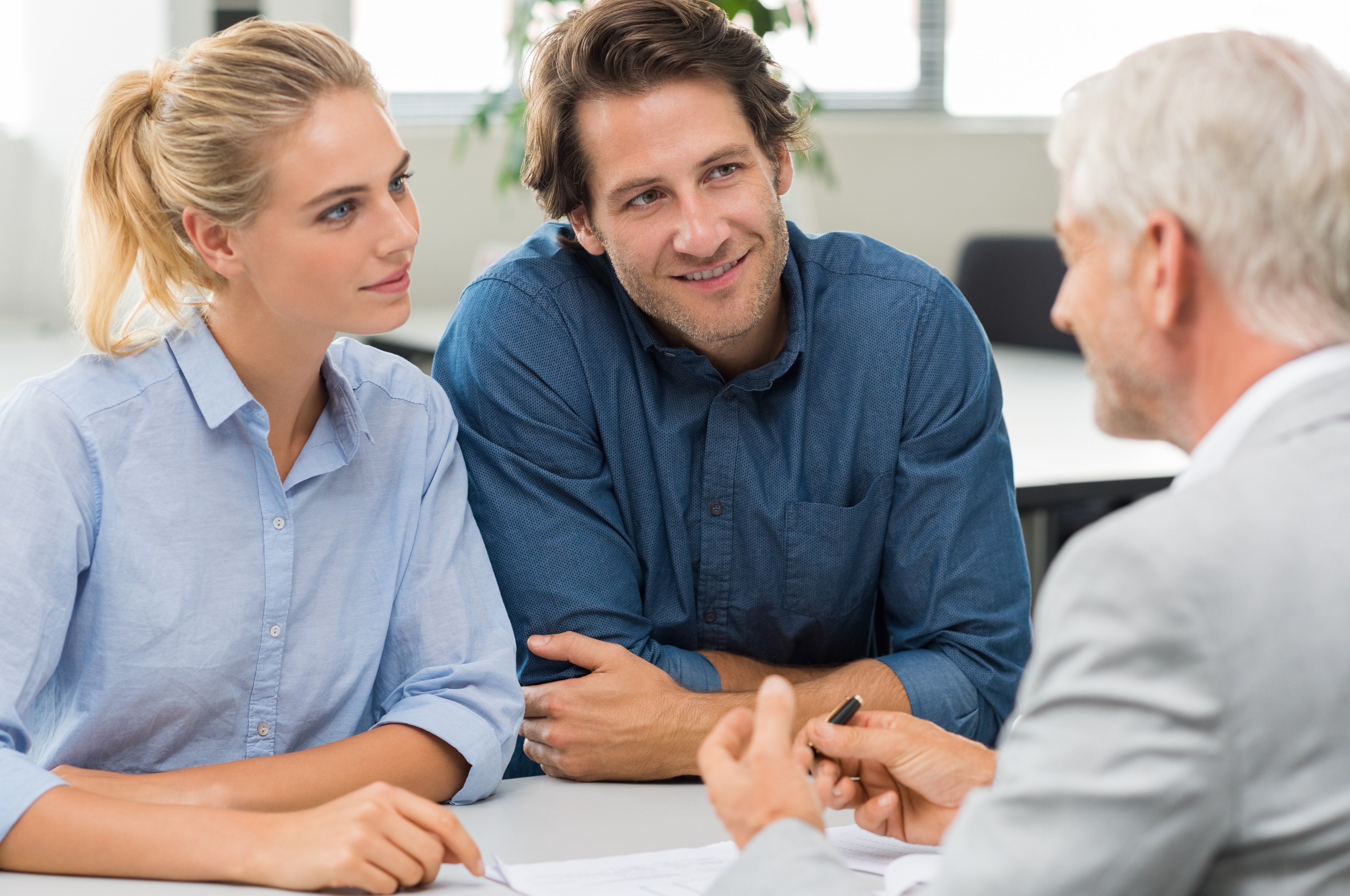 Financial-advisor-with-customer-539438468_3875x2573